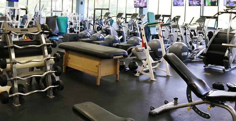 fitness equipment for cardio and strength training at gym