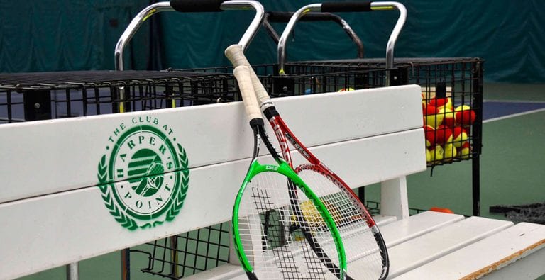racquets on bench at tennis courts in Cincinnati